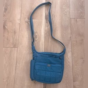 Brand New condition lug flutter crossbody
